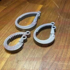 SuperheroDIY 3-PACK Cable Ratchets | SUPER COOL 3D-printed Ratchet Cable Clamp Organizers! Get Your Cords In Order With These Ratchet-style Cord Wraps -smitty shop 3 pack cable ratchets super cool 3d printed ratchet cable clamp organizers get your cords in order with these ratchet style cord wraps 646498 1500x