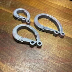 SuperheroDIY 3-PACK Cable Ratchets | SUPER COOL 3D-printed Ratchet Cable Clamp Organizers! Get Your Cords In Order With These Ratchet-style Cord Wraps -smitty shop 3 pack cable ratchets super cool 3d printed ratchet cable clamp organizers get your cords in order with these ratchet style cord wraps 736877 1500x