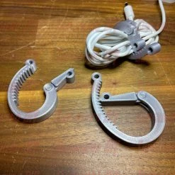 SuperheroDIY 3-PACK Cable Ratchets | SUPER COOL 3D-printed Ratchet Cable Clamp Organizers! Get Your Cords In Order With These Ratchet-style Cord Wraps -smitty shop 3 pack cable ratchets super cool 3d printed ratchet cable clamp organizers get your cords in order with these ratchet style cord wraps 993207 1500x